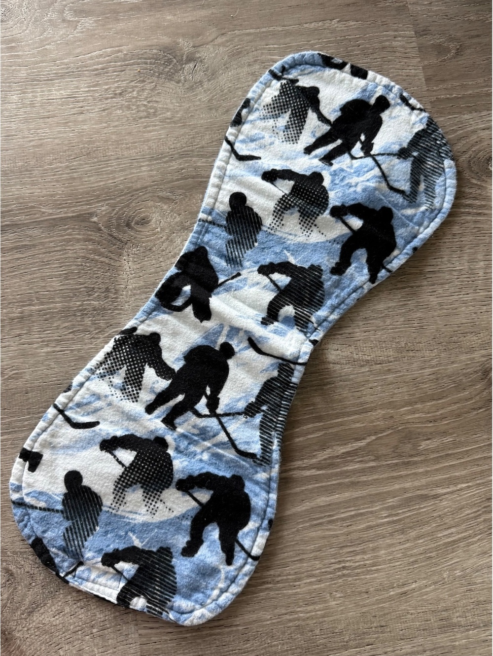 Baby Burp Cloth with Hockey Player Silhouette Pattern